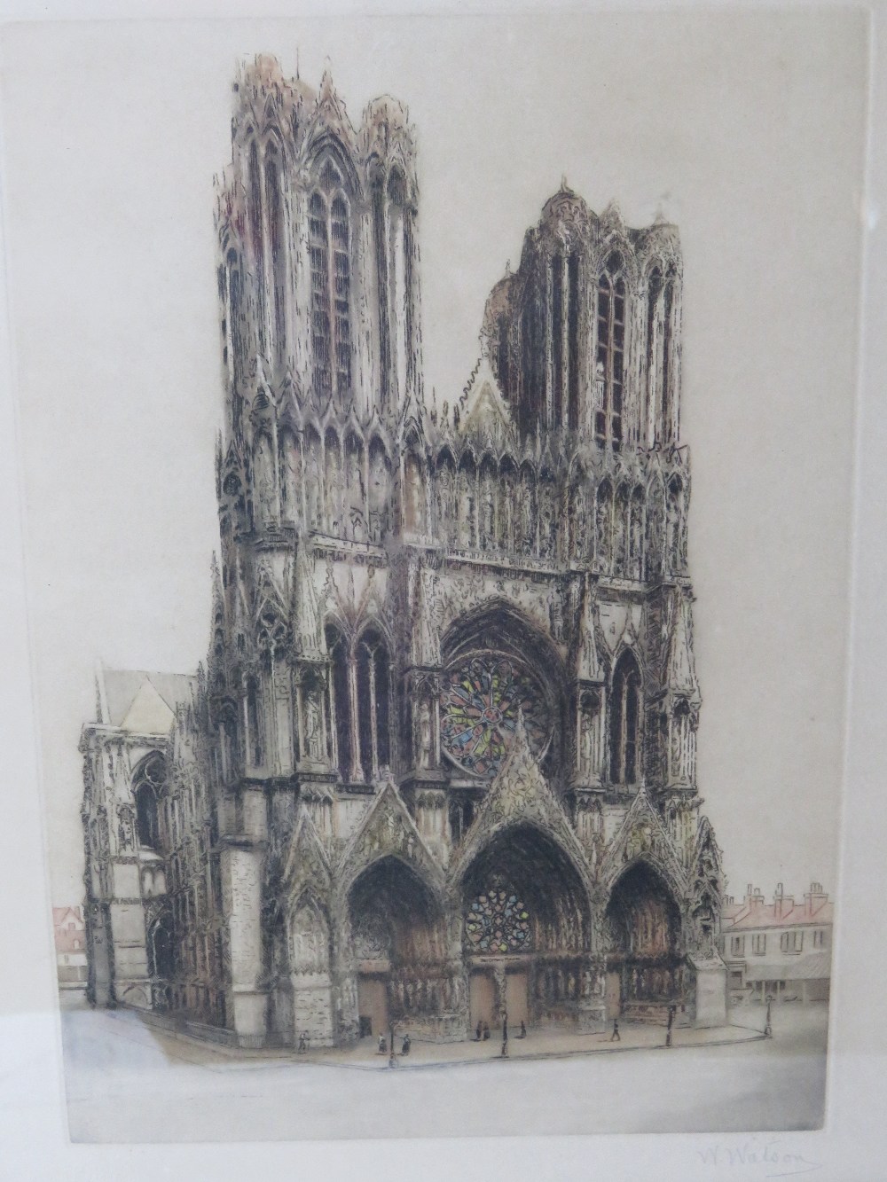 A signed print of a W Watson sketch of Notre Dame, framed and glazed.