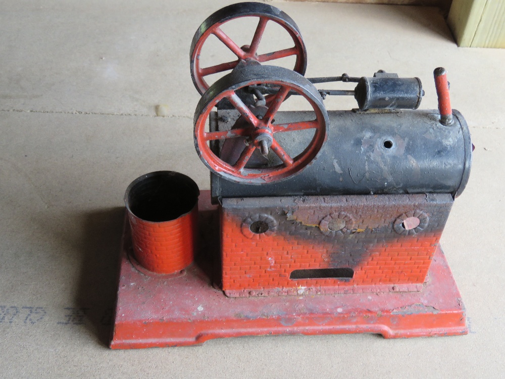 A Mamod type live steam engine casing in