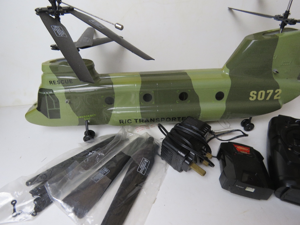 An remote controlled rescue helicopter with controller. Untested. - Image 3 of 3