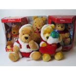 Five assorted Winnie the Pooh Disney cuddly toys inc two snow globes.