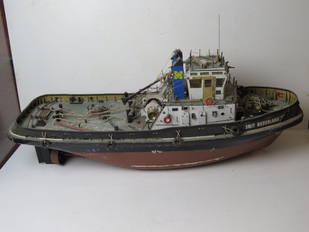 A model ship 'Smit Nederland' with various accessories, approx 83cm in length.