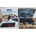 A Sega Mega-CD II in box with controller,