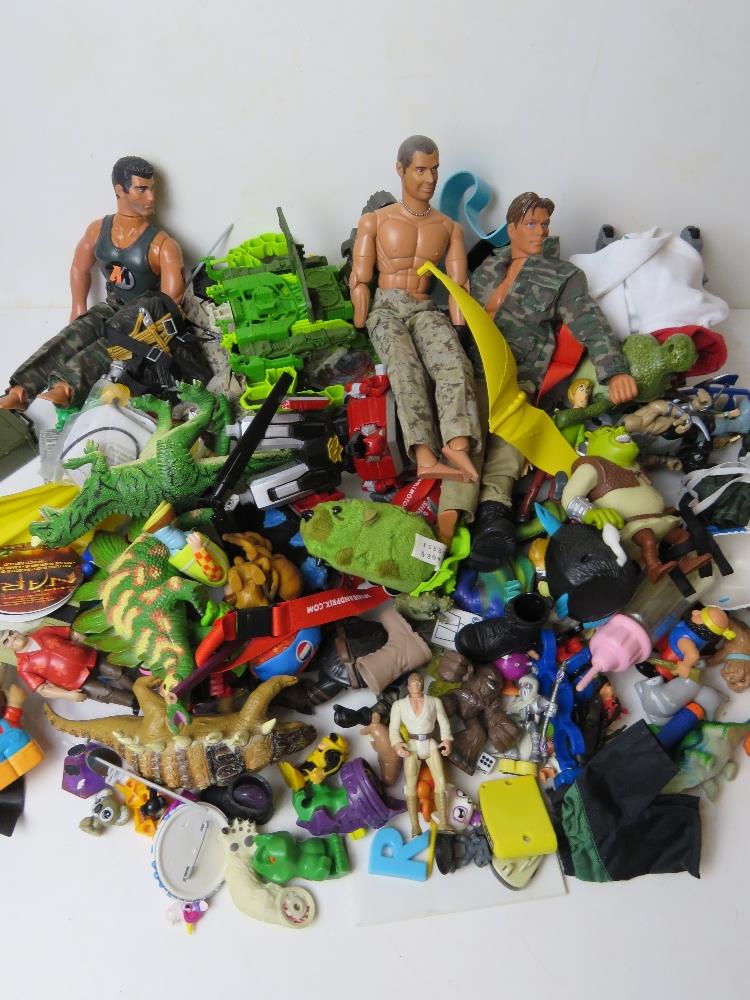 A quantity of assorted toys including Action Man, Wall-E, Star Wars, etc.