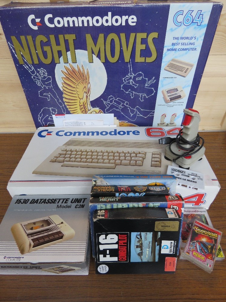 A Commodore 'Night Moves' C64 home computer console. Includes games, joystick, etc. Untested.