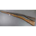 Two wooden rifle stocks.