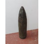 An LEIG18 7.5cm HE shell with steel fuse