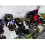 A COLLECTION OF VARIOUS FISHING REELS AND SPOOLS.