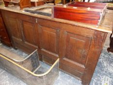 AN 18th C. OAK COFFER WITH FOUR PANELLED LID AND FRONT. W 146.5 x D 58 x H 73cms.