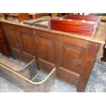 AN 18th C. OAK COFFER WITH FOUR PANELLED LID AND FRONT. W 146.5 x D 58 x H 73cms.