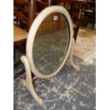 AN OVAL DRESSING TABLE MIRROR IN PINK ROPE MODELLED FRAME