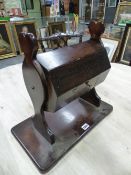 A LATE 19th C. MAHOGANY BALLOT BOX , THE OCTAGONAL DRUM ROTATABLE BETWEEN TWO PILASTERS ON A PLINTH