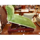 A MAHOGANY GOUT STOOL LABELLED FOR J WARD AND UPHOLSTERED IN GREEN VELVET