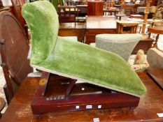 A MAHOGANY GOUT STOOL LABELLED FOR J WARD AND UPHOLSTERED IN GREEN VELVET