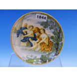 AN ITALIAN MAIOLICA DISH, POSSIBLY CASTELLI, PAINTED WITH CUPID AND VENUS SEATED BELOW A TREE BY A