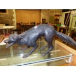 A BRONZED COMPOSITION FIGURE OF A FOX BARKING AS IT STANDS. W 69cms.