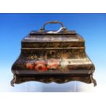 AN EARLY VICTORIAN TOLE TEA CADDY PAINTED WITH FLOWERS ON A GILT BLACK GROUND, THE INTERIOR WITH TWO