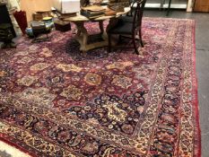 AN ANTIQUE PERSIAN LARGE COUNTRY HOUSE CARPET OF CLASSIC DESIGN. 515 x 410cms