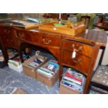 AN ANTIQUE MAHOGANY SIDEBOARD, THE SERPENTINE FRONT WITH FIVE DRAWERS, SQUARE SECTIONED LEGS ON SPAD