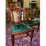 A PAIR OF GEORGE III MAHOGANY CHIPPENDALE TASTE CHAIRS, THE GREEN VELVET DROP IN SEATS ABOVE