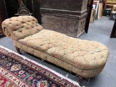 A VICTORIAN CHAISE LONGUE WITH BUTTONED BACK AND ON TURNED MAHOGANY LEGS WITH CASTER FEET. W 190cm