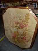 A LARGE WOODEN FRAMED WALL TAPESTRY.