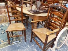 A SET OF NINE RUSH SEATED OAK LADDER BACK CHAIRS INCLUDING TWO WITH ARMS