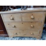 A VICTORIAN PINE CHEST OF TWO SHORT AND TWO LONG DRAWERS ON BRACKET FEET. W 102 x D 50 x H 80cms.