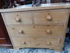 A VICTORIAN PINE CHEST OF TWO SHORT AND TWO LONG DRAWERS ON BRACKET FEET. W 102 x D 50 x H 80cms.