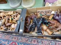 A COLLECTION OF CARVED AFRICAN ELEPHANTS, OTHER FIGURES ETC.