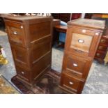 A PAIR OF VINTAGE OAK THREE DRAWER FILING CABINETS, EACH. W 38 x D 68 x H 114cms.