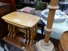 A NEST OF THREE 20th C. OAK TABLES TOGETHER WITH AN OAK TORCHERE. H 97cms.