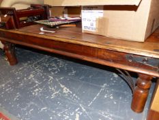 A MODERN INDIAN HARDWOOD COFFEE TABLE, THE RECTANGULAR TOP WITH METAL STUDS AT THE EDGES. W 135 x