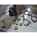 THREE VARIOUS PAIRS OF HANDCUFFS TO INCLUDE ONE PAIR LEATHER CASE TOGETHER WITH SIX PADLOCKS WITH LE