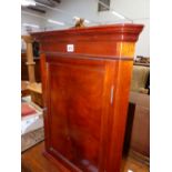 A MODERN MAHOGANY CORNER CUPBOARD. W 50.5 x H 63cms.