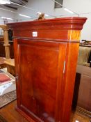 A MODERN MAHOGANY CORNER CUPBOARD. W 50.5 x H 63cms.