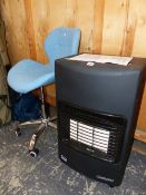 A CALOR CLASSIC GAS HEATER TOGETHER WITH A BLUE UPHOLSTERED DESK CHAIR