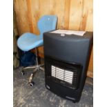 A CALOR CLASSIC GAS HEATER TOGETHER WITH A BLUE UPHOLSTERED DESK CHAIR