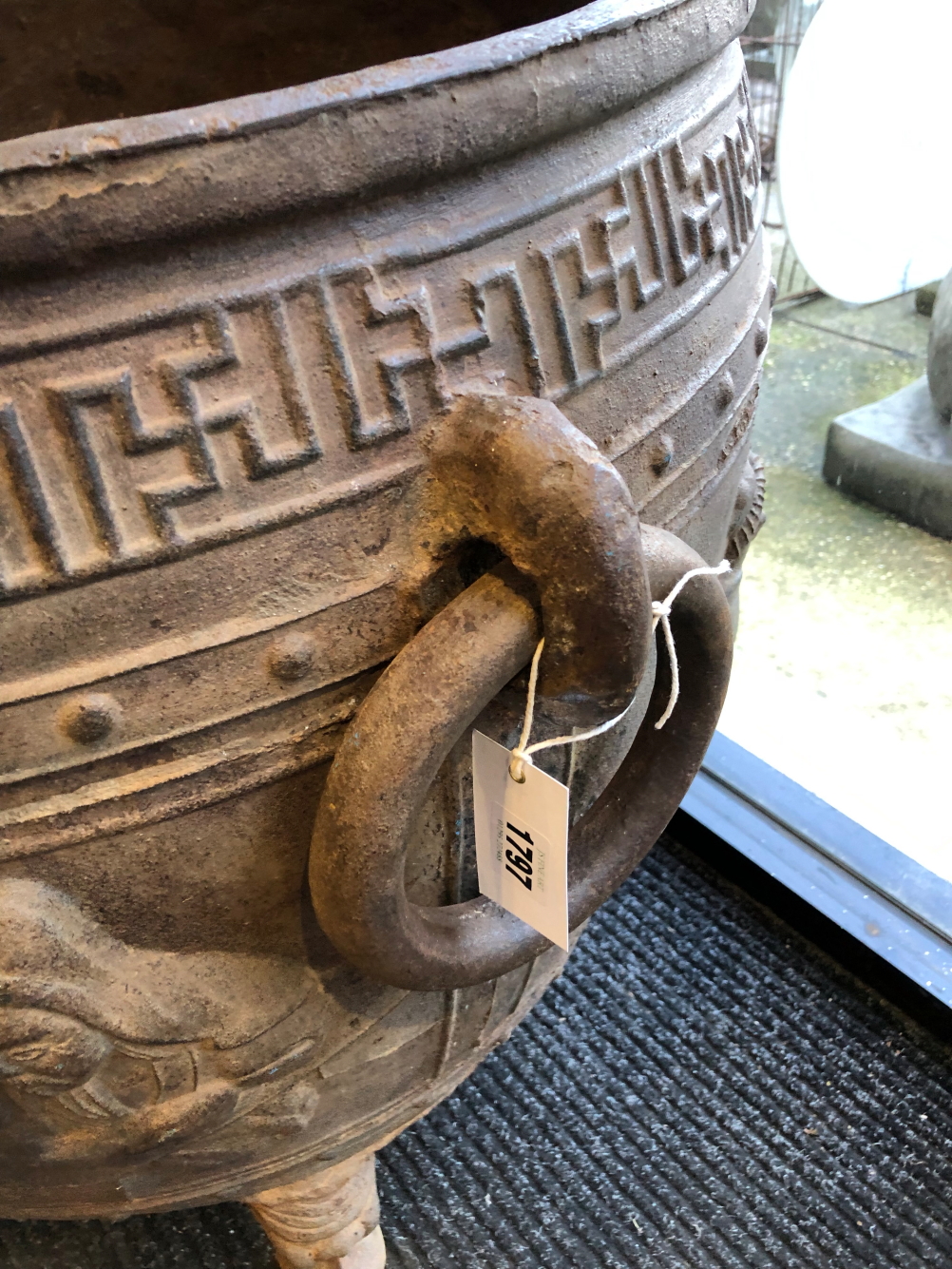 A CHINESE CAST IRON RING HANDLED CAULDRON, THE ROUNDED SIDES CAST WITH FIGURES AND INSCRIPTIONS - Image 4 of 9