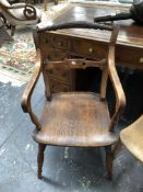 A 19th C. YEW AND OAK OXFORD TYPE ELBOW CHAIR TOGETHER WITH AN OAK KITCHEN CHAIR