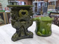 A BRETBY PLANTER MOULDED IN RELIEF WITH A DRAGON FLY AND A FLOWER ON THE GREEN FAUX BOIS GROUND. H