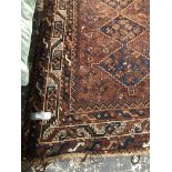 AN ANTIQUE PERSIAN SHIRAZ RUG