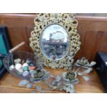 AN ANTIQUE BRASS WALL MIRROR, A CANDLE STAND, STONE EGGS ETC.
