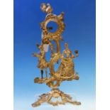 A LATE 18th C. SILVERED METAL WATCH STAND, THE COCKEREL SURMOUNT ABOVE THE FIGURE OF A MALE FLAUTIST