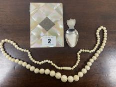 A MOTHER OF PEARL AND SILVER MOUNTED CARD CASE A CONTINENTAL SILVER CADDY SPOON.