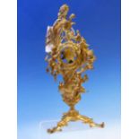 A LATE 18th/EARLY 19th C. GILT METAL WATCH STAND CAST WITH A COCKEREL AND TWO AMORINI REPRESENTING