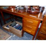 A 20th C. OAK DESK, THE RECTANGULAR TOP ABOVE A SLIDE OVER THREE DRAWERS TO ONE SIDE, THE SQUARE