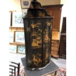 A GEORGIAN CHINOISERIE CORNER CUPBOARD, THE SHAPED BOW FRONT SURMOUNTED BY A WATERFALL OF THREE