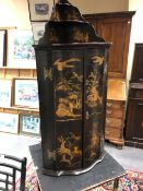 A GEORGIAN CHINOISERIE CORNER CUPBOARD, THE SHAPED BOW FRONT SURMOUNTED BY A WATERFALL OF THREE