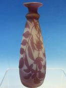 AN ACID ETCHED MAUVE CAMEO GLASS VASE WORKED WITH FLOWERS AND FOLIAGE. H 15cms.