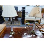 A PAIR OF BRASS AND GLASS TABLE LAMPS.